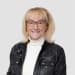 En profilbild av fastighetsmäklare Ann Sjöberg