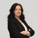 En profilbild av fastighetsmäklare Anneli Göransdotter