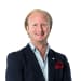 En profilbild av fastighetsmäklare Michael Sjöholm