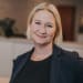 En profilbild av fastighetsmäklare Erica Dahl