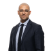 En profilbild av fastighetsmäklare Victor Aghester