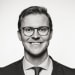 En profilbild av fastighetsmäklare Jacob Iwarsson