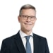 En profilbild av fastighetsmäklare Martin Granberg