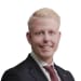En profilbild av fastighetsmäklare Gustav Westergren