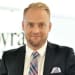 En profilbild av fastighetsmäklare Krister Florin