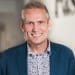 En profilbild av fastighetsmäklare Gustav Björkman
