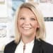 En profilbild av fastighetsmäklare Diana Kristensen