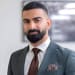 En profilbild av fastighetsmäklare Marvin Yousif
