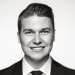 En profilbild av fastighetsmäklare Andreas Palmqvist