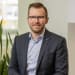 En profilbild av fastighetsmäklare Olle Löfberg