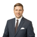 En profilbild av fastighetsmäklare Jesper Nilsson