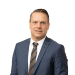 En profilbild av fastighetsmäklare Andreas Wallin