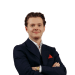 En profilbild av fastighetsmäklare Daniel Pavel