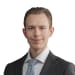 En profilbild av fastighetsmäklare Hugo Hassellund