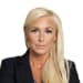 En profilbild av fastighetsmäklare Elina Vadász