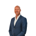 En profilbild av fastighetsmäklare Håkan Thelin