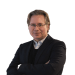 En profilbild av fastighetsmäklare Carl Svedberg