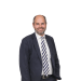 En profilbild av fastighetsmäklare Christian Ekengren