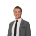 En profilbild av fastighetsmäklare Albin Haapakorpi