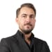 En profilbild av fastighetsmäklare Alen Nuhanovic