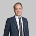 En profilbild av fastighetsmäklare Emil Borgemo