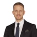 En profilbild av fastighetsmäklare Ulf Block