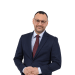 En profilbild av fastighetsmäklare Ronny Nocera