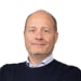 En profilbild av fastighetsmäklare Mikael Fritzell