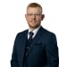 En profilbild av fastighetsmäklare Tobias Wallström
