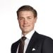 En profilbild av fastighetsmäklare Jacob Hempel