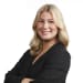 En profilbild av fastighetsmäklare Mathilda Magnusson