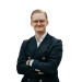En profilbild av fastighetsmäklare Filip Åberg