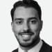 En profilbild av fastighetsmäklare Ayham Khaled