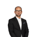 En profilbild av fastighetsmäklare Peter Forsling