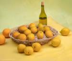 Basket with lemons and a bottle (after Van Gogh) 54 x 64 cm, archival pigment print, framed.