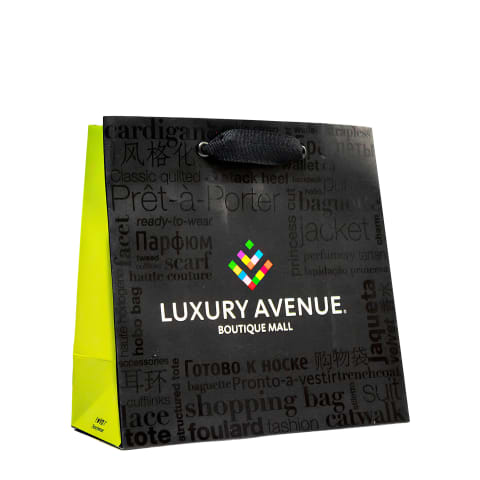 Bolsa de papel impresa con acabado de barniz UV a registro Luxury Avenue.