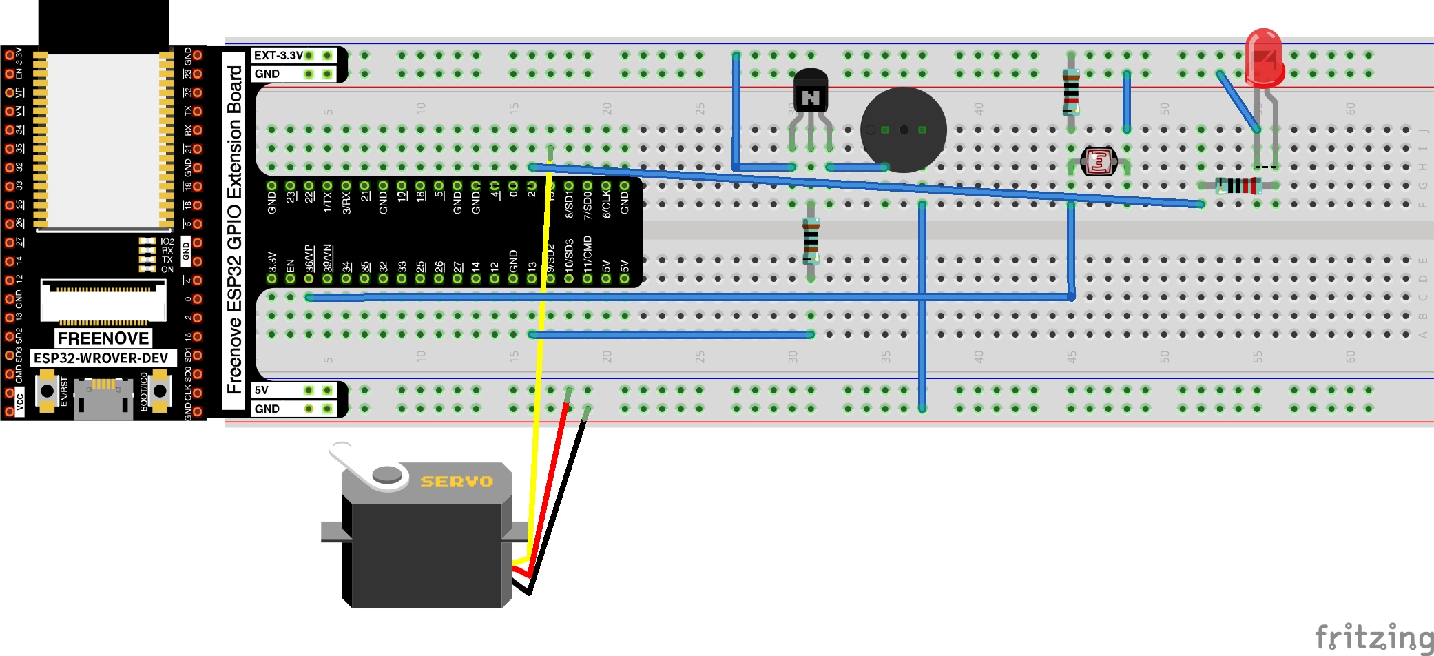 Servo, a passive buzzer, an LED, and a photoresistor Breadboard View image