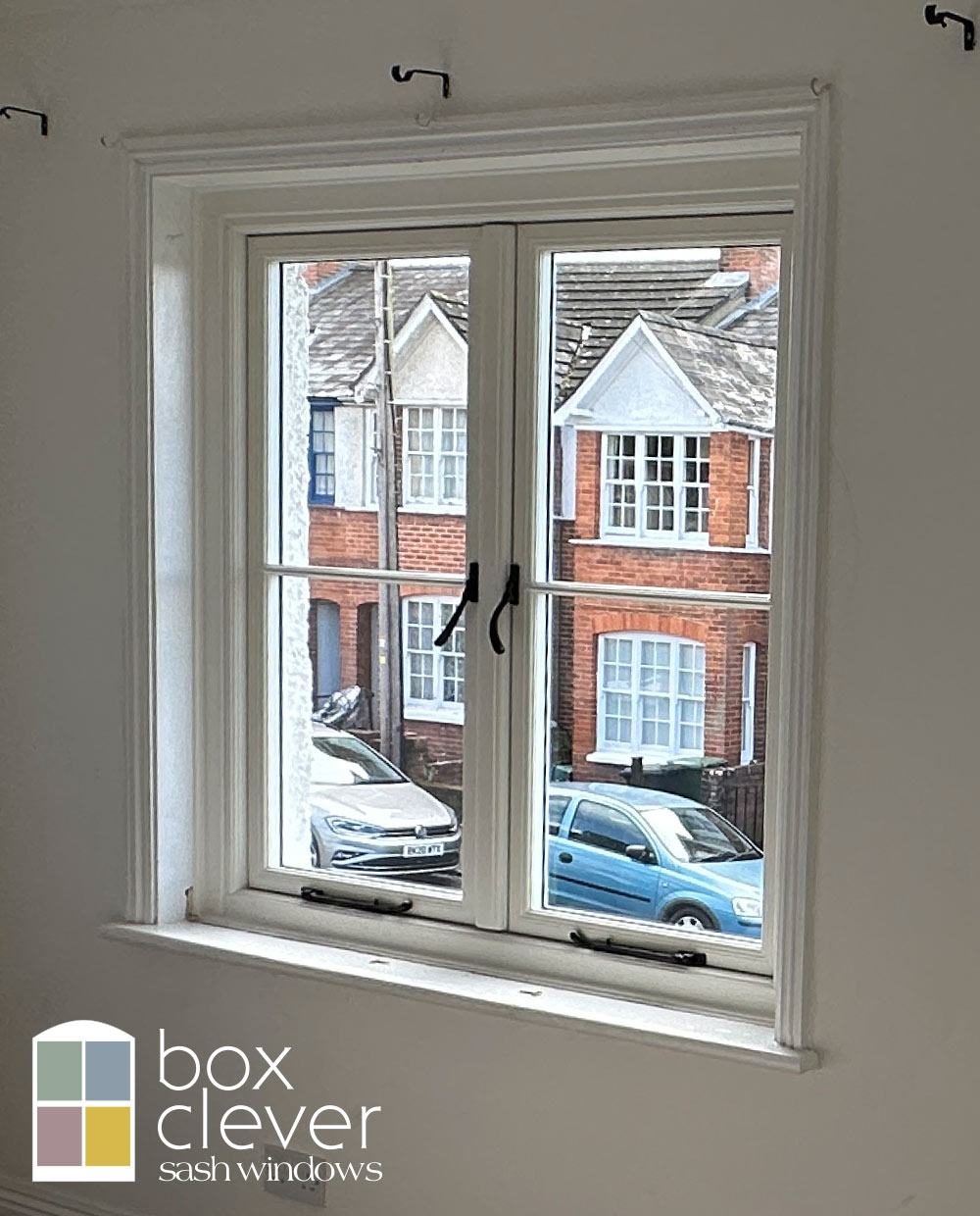 Evolution Storm 2 Flush Casement Window with Black Bulb End Handles and Black Peg Stays