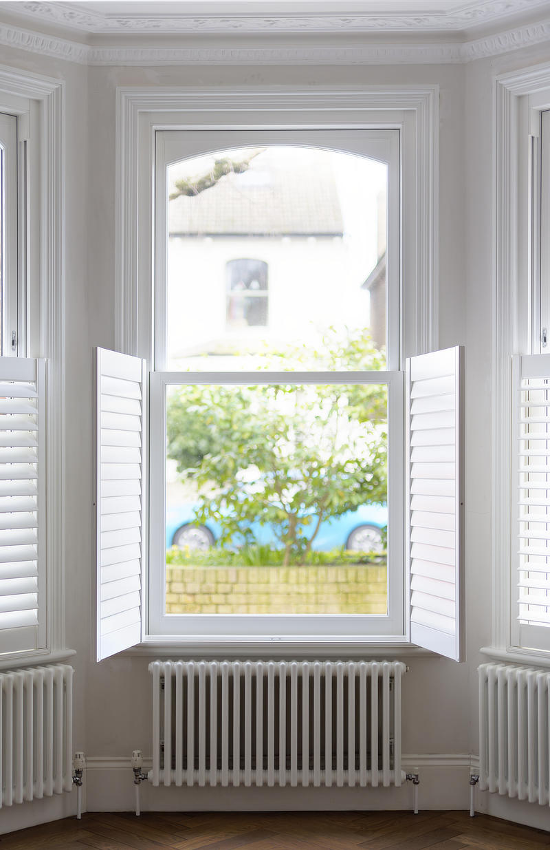 https://res.cloudinary.com/boxcleversashwindows/image/upload/v1747397113/website/images/latest-work/2025-05-masterframe-arched-sash-windows-west-london/After2.jpg