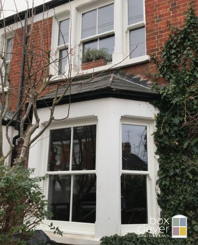 3 Part Bay and 3 Connected Windows with Single Vertical Bar and White Woodgrain Finish