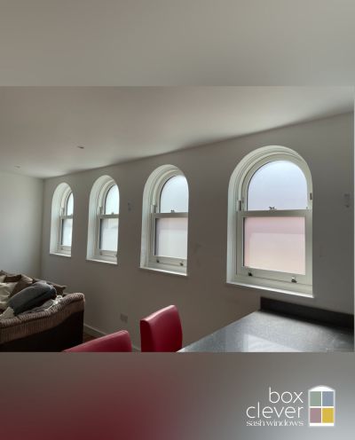 Interior view of Arched Sash Windows with Satin Style Obscure Glass