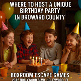 Group of kids and teens celebrating a birthday at Boxroom Escape Games in Hollywood, Florida, smiling while solving puzzles together with balloons, cake, and festive decorations in the background.