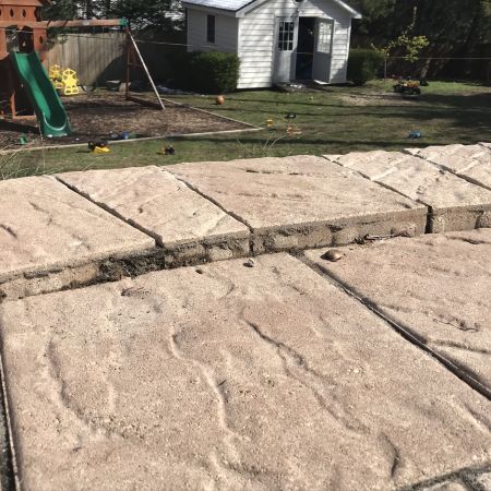 Paver patio has pavers that are settling at different levels leaving gaps and lips that shouldn't be there