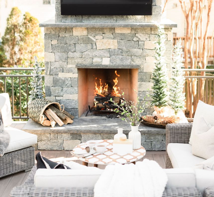 Wood burning outdoor fireplace on a pvc deck