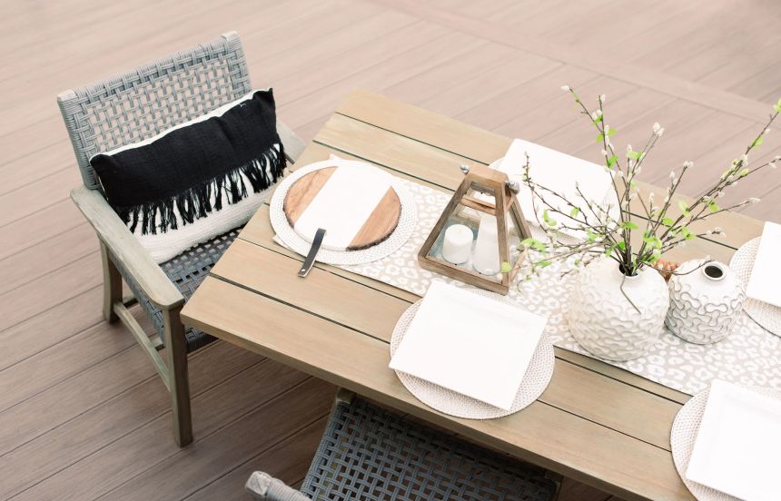 Dining table on a capped composite deck