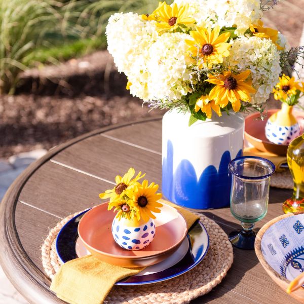 Dining table with cut flowers from the landscape