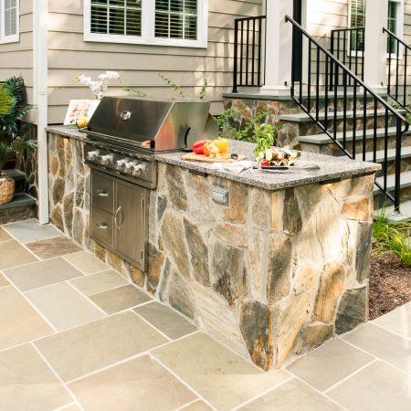 Grill Island installed on the edge of the patio by the entry stairs into the backdoor