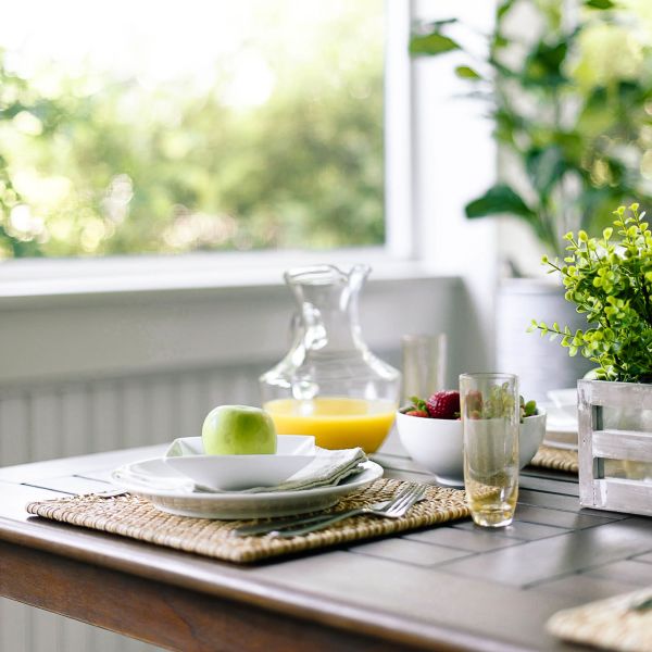 Sunroom table set for brunch