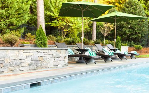 Fiberglass swimming pool and deck chairs in Montpelier VA