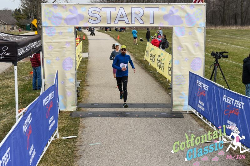 blog author finishing at the cottontail classic race being followed by a very happy looking woman